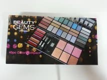 Makeup Beauty Gem`s 45 piece color compact includes: 30 eyeshadows, 5 lip glosses, 6 bluhes, 2 applicators, 1 lip brush and 1 blush brusht