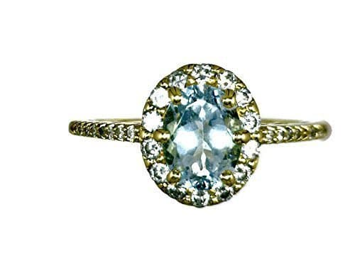 18 K Yellow Gold Aquamarine Halo Ring Oval Stone 0.69 CT and Diamonds 0.46 CT