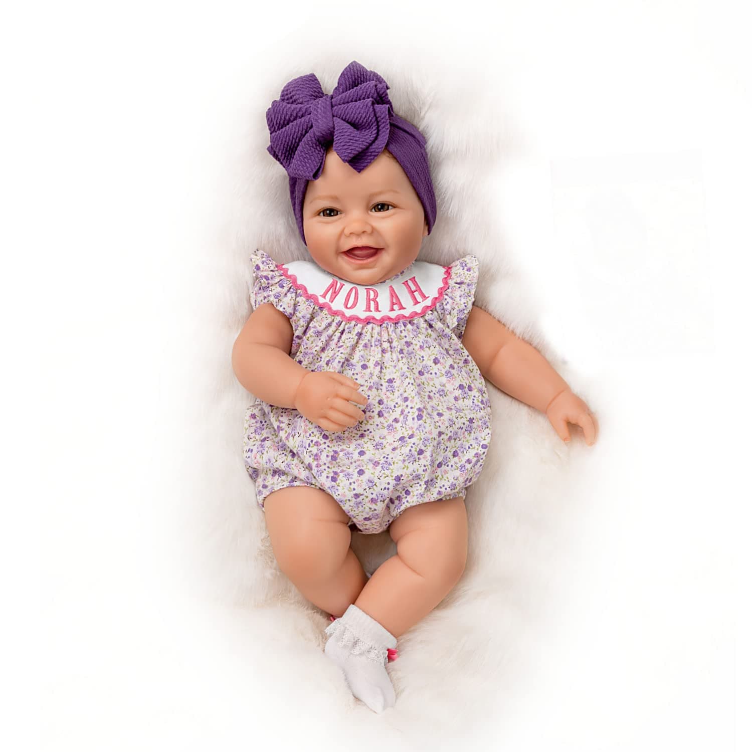 The Ashton-Drake Galleries Lifelike Reborn Norah Baby Doll, 17 inches, Handcrafted RealTouch® Vinyl Collectible by Ping Lau, Purple Bow