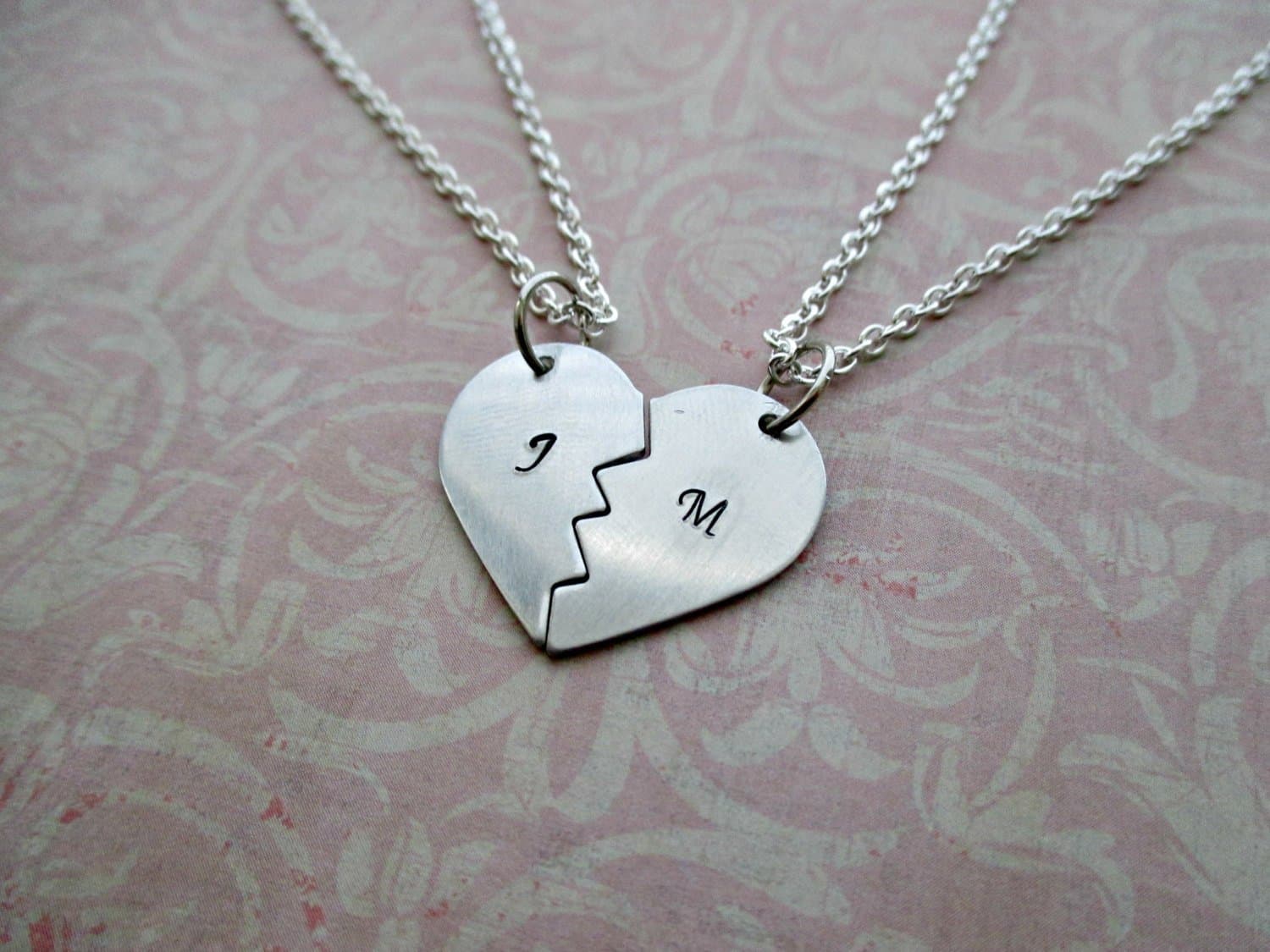 Hand stamped aluminum two halves of one heart broken heart friendship necklace with initials