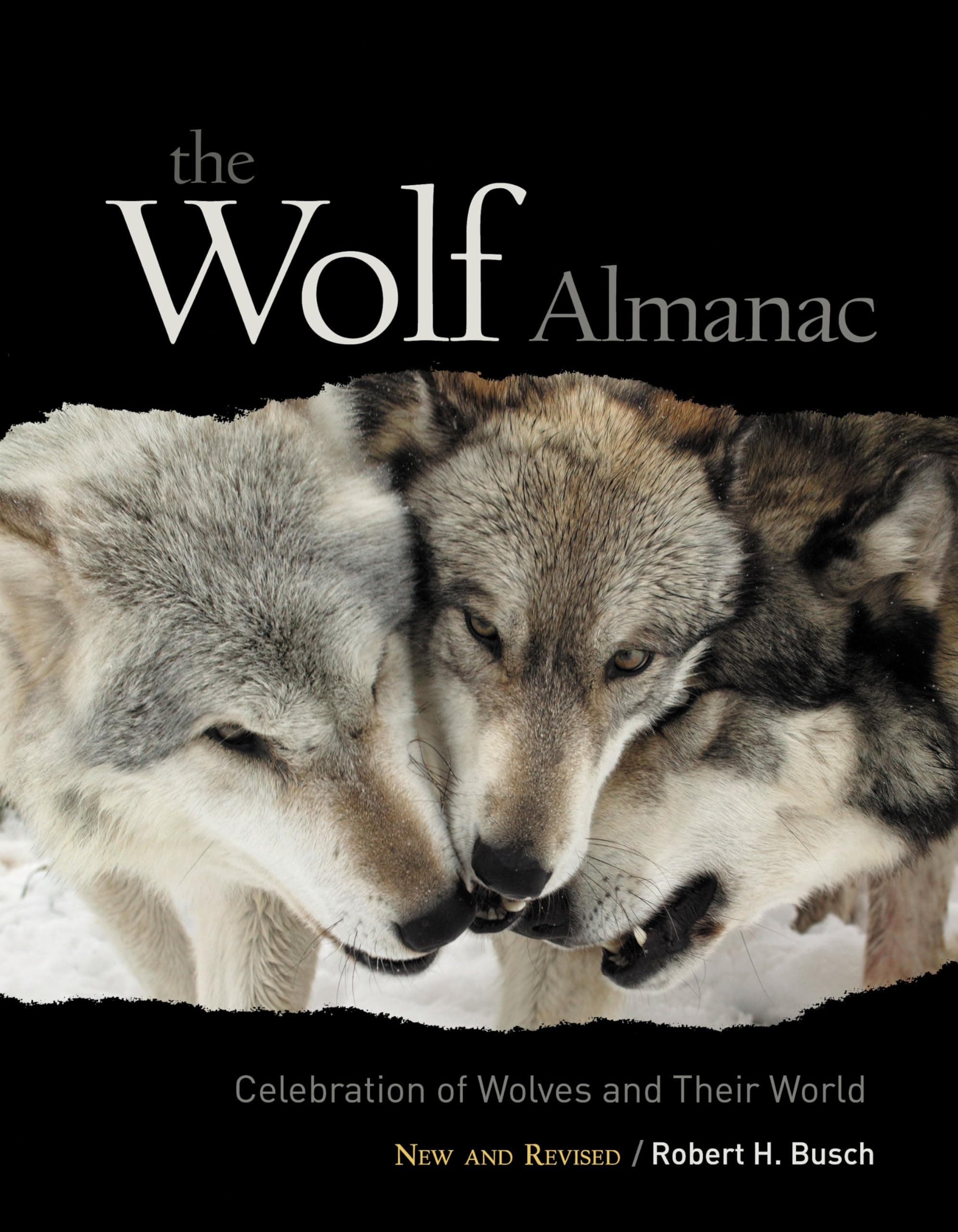 Wolf Almanac, New and Revised: A Celebration Of Wolves And Their World Paperback – August 1, 2007