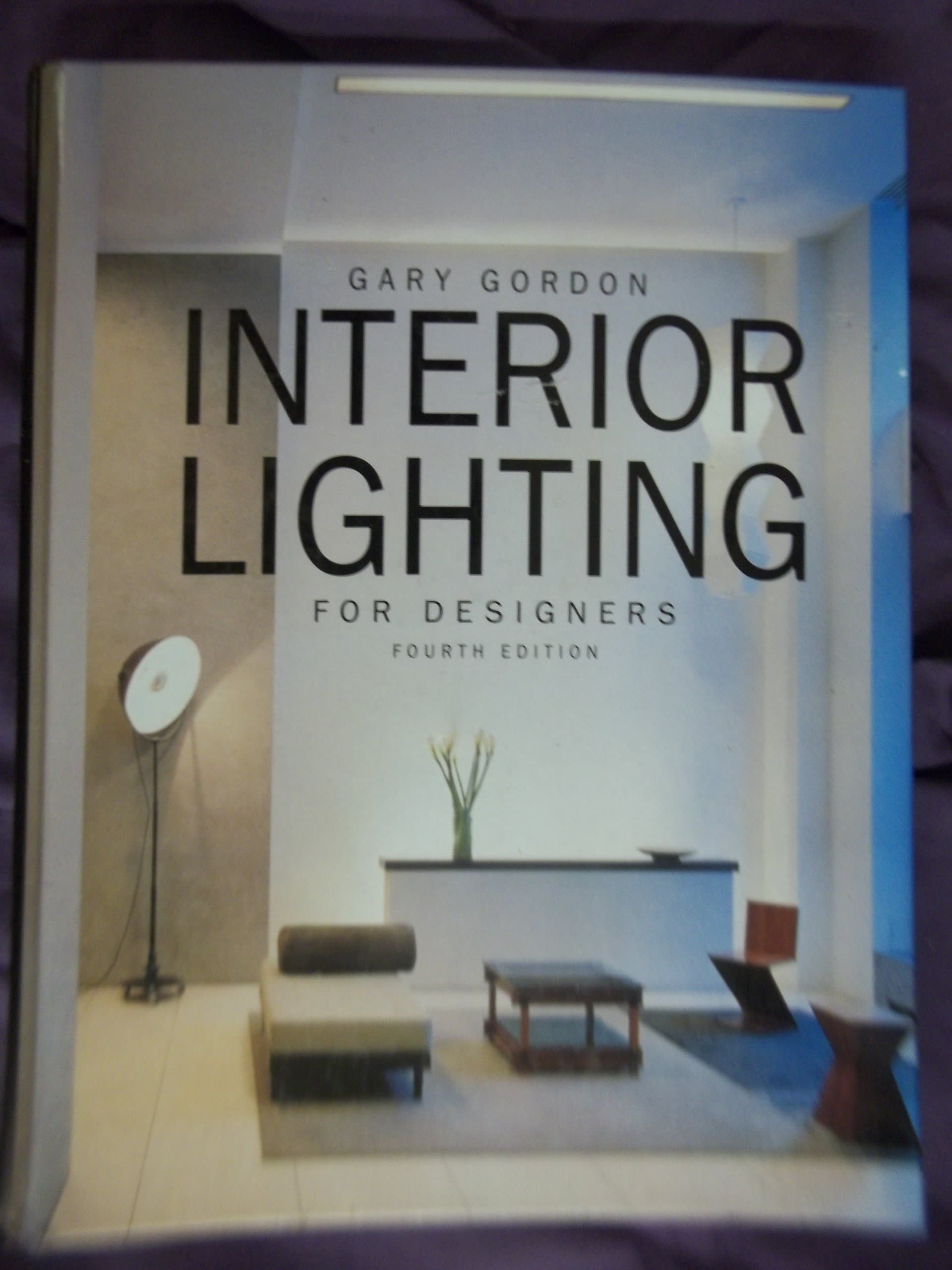Interior Lighting for Designers Hardcover – Import, 28 January 2003