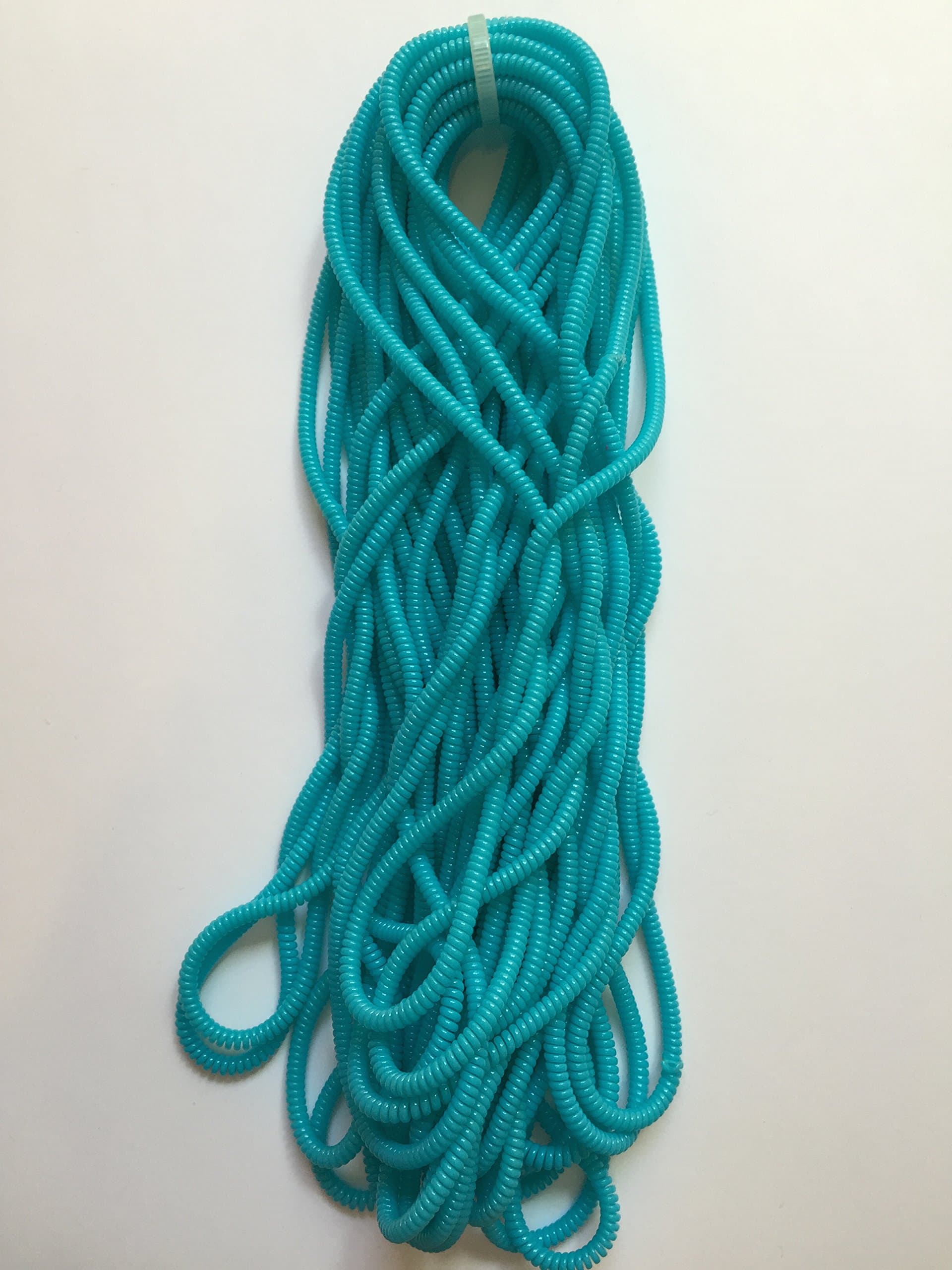 Set of 4 Spiral Cord Protectors for Cell Phone Charger Cables, Tablet Charger Cables and Earphone Cords (Light Blue)