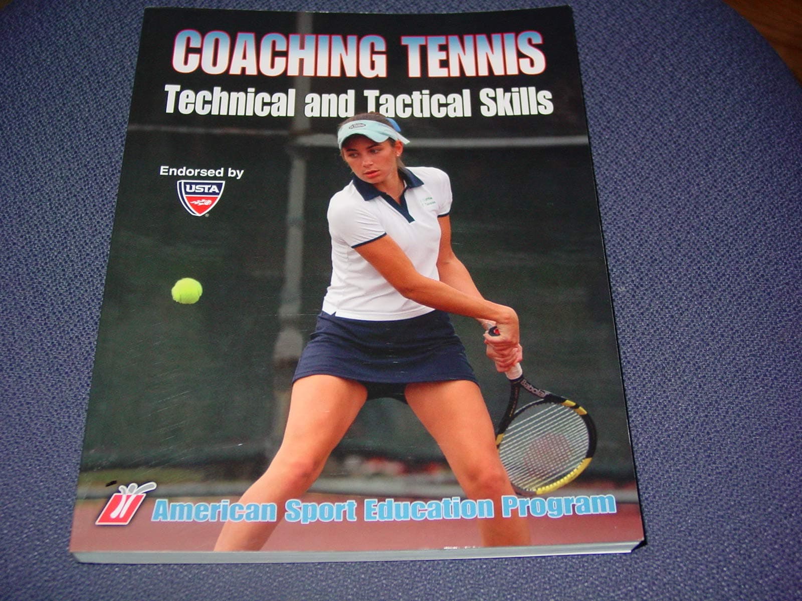 Coaching Tennis Technical & Tactical Skills Paperback – May 29, 2009